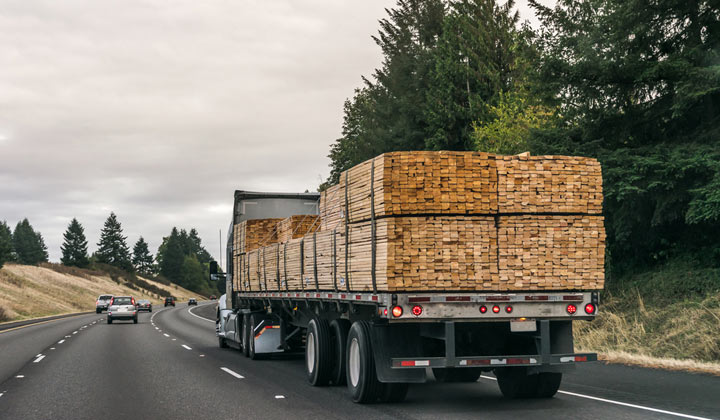 stacks of wooden boards on truck for delivery
