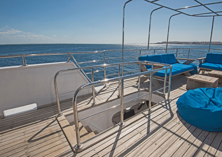 side perspective of Teak paneled floor of yacht